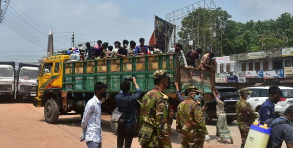 মাগুরায় এক ট্রাক না’গঞ্জ ফেরত মানুষসহ আটক