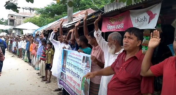 মোড়েলগঞ্জে শিশু নির্যাতনকারী ইউপি  মেম্বরের বিচারের দাবিতে মানববন্ধন