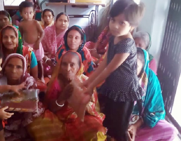 শারদীয়া দুর্গাপূজা উপলক্ষে বস্ত্র বিতরণ